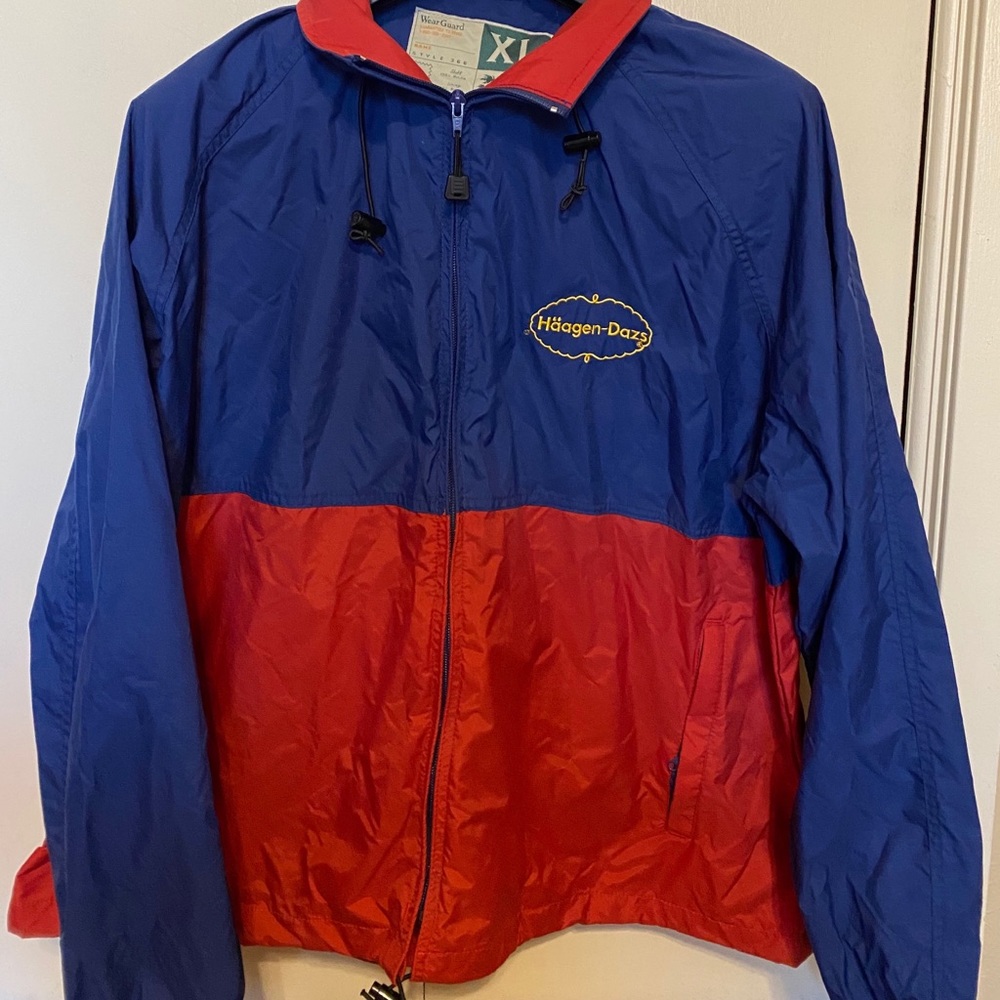 Häagen-Dazs Windbreaker with hood on neck.